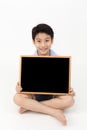 Cute asian Boy Holding Blank board Royalty Free Stock Photo