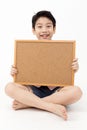 Cute asian Boy Holding Blank board Royalty Free Stock Photo