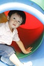 Cute Asian boy in a playground Royalty Free Stock Photo