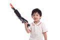 Cute asian boy playing toy gun Royalty Free Stock Photo