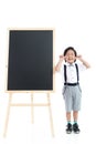 Cute Asian child with black board