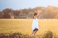 Cute asian child girl running and playing toy paper airplane Royalty Free Stock Photo