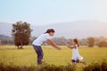 Cute asian child girl running to her mother to give a hug Royalty Free Stock Photo