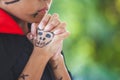 Asian child girl wearing halloween costumes and makeup making hands folded in prayer on Halloween celebration Royalty Free Stock Photo