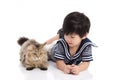 Cute asian child lying with tabby cat Royalty Free Stock Photo