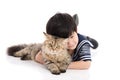 Cute asian child lying with tabby cat Royalty Free Stock Photo