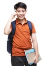 Cute asian child with school stationery on white background Royalty Free Stock Photo