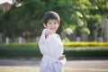 Cute Asian child in white kimono during training karate Royalty Free Stock Photo