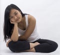 Cute asian girl on background meditating Royalty Free Stock Photo