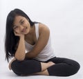 Cute asian girl on background meditating Royalty Free Stock Photo