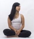 Cute asian girl on background meditating Royalty Free Stock Photo