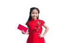 Cute Asian girl in chinese cheongsam and Tradition Chinese dress with red envelope , Chinese new year concept Royalty Free Stock Photo