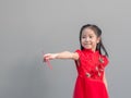 Cute Asian girl in chinese cheongsam and Tradition Chinese dress with red envelope , Chinese new year concept Royalty Free Stock Photo