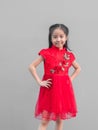 Cute Asian girl in chinese cheongsam and Tradition Chinese dress with red envelope , Chinese new year concept Royalty Free Stock Photo