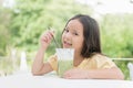 Cute asian girl drinking ice milk green tea Royalty Free Stock Photo