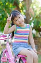 Cute asian girl enjoy to ride bicycle Royalty Free Stock Photo