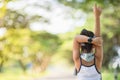 Cute asian girl exercise in gardent background Royalty Free Stock Photo