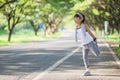 Cute asian girl exercise in gardent background Royalty Free Stock Photo