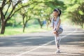 Cute asian girl exercise in gardent background Royalty Free Stock Photo