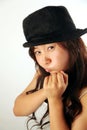 Cute Asian girl with hat Royalty Free Stock Photo