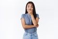 Cute asian girl heard someone being shockingly rude, gasping ambushed and surprised, cover opene mouth not screem, lift Royalty Free Stock Photo