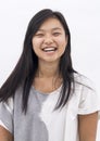 Cute laughing asian girl on isolated background Royalty Free Stock Photo