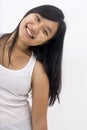 Cute funny asian girl on isolated background smiling