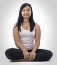 Cute asian girl on isolated background on meditation Royalty Free Stock Photo