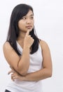 Cute asian girl on isolated background thinking Royalty Free Stock Photo