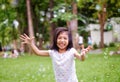 A cute girl playing with bubbles, laughing and smiling Royalty Free Stock Photo