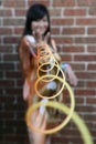 Cute Asian girl with slinky toys