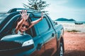 Asian girl smiling while sitting in the car. Travel on vacation Royalty Free Stock Photo