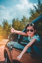 Asian girl smiling with perfect smile while sitting in the car. Royalty Free Stock Photo