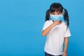 Cute Asian girl wearing mask to prevent the virus PM2.5, Coronavirus, 2019-nCoV asian little girl feeling unwell and coughing as