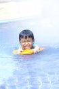 Cute Asian Kid Posing at Swimming Pool Royalty Free Stock Photo