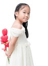 Cute asian little bridesmaid holding heart flower isolated Royalty Free Stock Photo