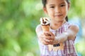 Cute asian little child girl holding delicious icecream cone Royalty Free Stock Photo