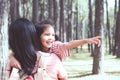 Cute asian little child girl hugging her mother with love Royalty Free Stock Photo