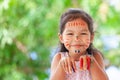 Cute asian little child girl with painted hands smiling with fun Royalty Free Stock Photo