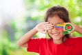 Cute asian little child girl with painted hands smiling Royalty Free Stock Photo