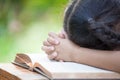 Cute asian little child girl praying with folded her hand Royalty Free Stock Photo