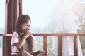 Cute asian little child girl praying with folded her hand Royalty Free Stock Photo