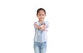 Cute asian little child girl reaching cross arm hands break in front of isolated on white background Royalty Free Stock Photo