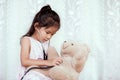 Cute asian little child girl with stethoscope playing doctor Royalty Free Stock Photo