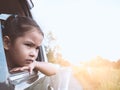 Cute asian little child girl traveling by car Royalty Free Stock Photo