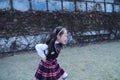 Cute Asian little beautiful girl run in the park Royalty Free Stock Photo