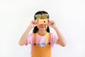 Cute Asian little girl kid taking picture with photo camera toy isolated on white background Royalty Free Stock Photo