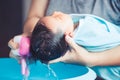 Cute asian newborn baby girl take a bath.