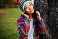 Cute Asian Teen Girl Smilling In Autumn Forest. Candid Woman In Hat Enjoying Autumn In The Forest . Royalty Free Stock Photo