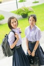 Cute Asian Thai high schoolgirls student couple in school uniform